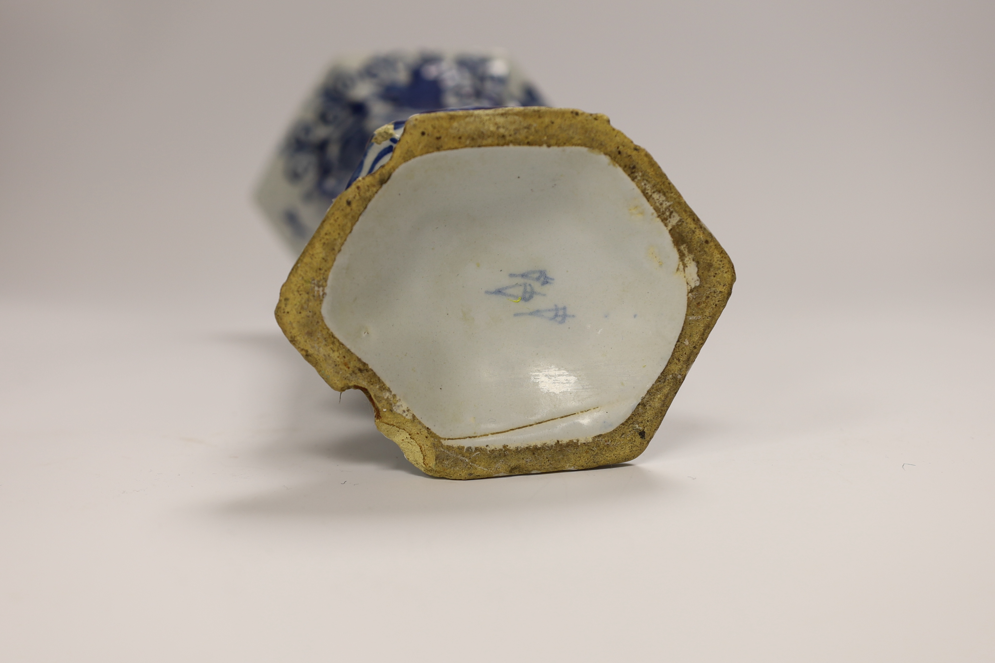 An 18th century hexagonal Delft vase, two pearlware blue and white baskets and a similar dish, tallest 27cm